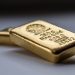 Gold Drops 0.2% to $2,415.61 Amid Strong Dollar