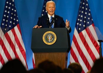 Biden faces more calls to withdraw as he visits Michigan to rally support