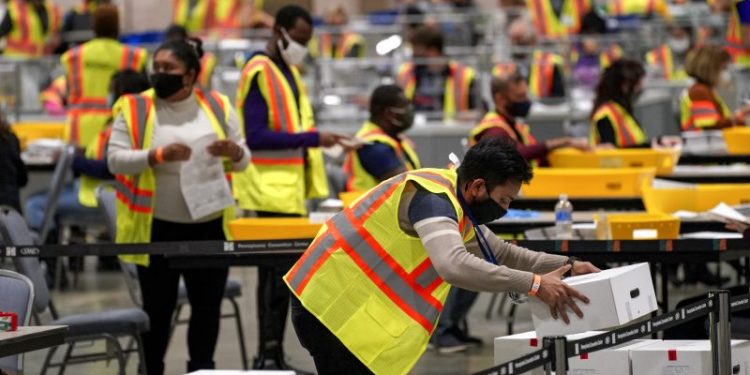 Trump, Republicans push swing-state courts to reject mail-in ballots