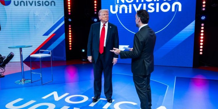 Trump tries softer tone but reprises false migrant claims at Univision town hall
