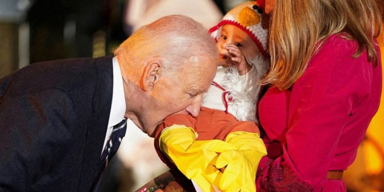 Biden bites babies visiting for White House Halloween trick-or-treat celebration