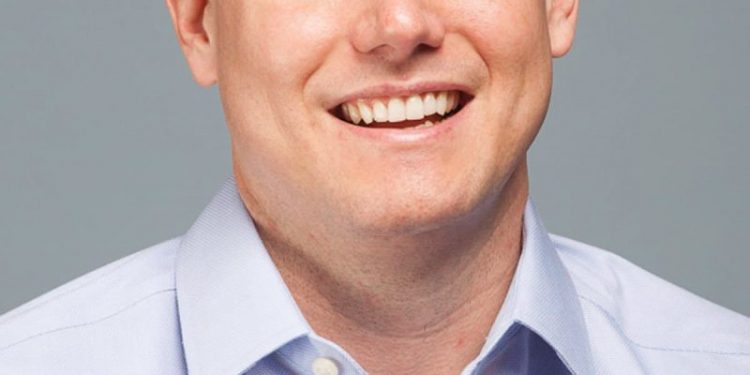 Amazon taps Whole Foods CEO to oversee grocery business