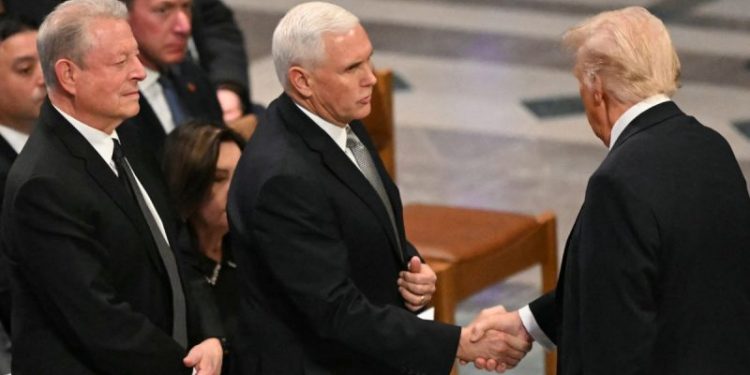 Trump, Pence shake hands at Carter funeral in first public meeting since leaving office