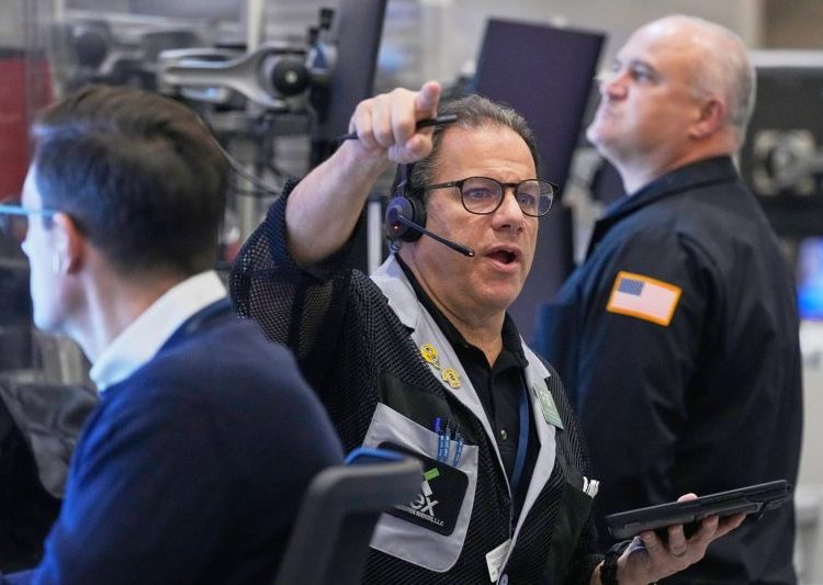 Stock market sinks as AI and interest rate worries grip investors