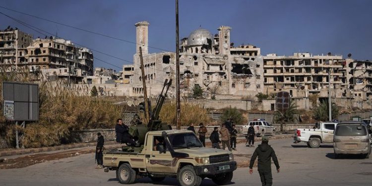 Turkey says Syria using force is an option against US-backed fighters who helped defeat ISIS